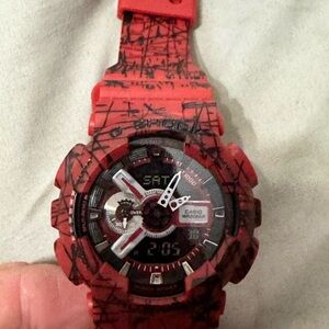 Casio Red and Black Watch with black slashes
